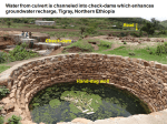 Farmers diverting water from a culvert into a percolation pond for supplementary irrigation and groundwater recharge in Tigray, Ethiopia